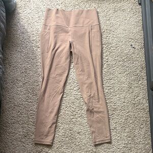 Athleta Salutation Stash Tight w/ Pockets Size M